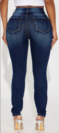Women’s size 7 Kalisha Stretch Ripped Skinny Jeans - Dark Wash